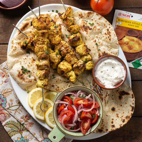 Hawiian chicken curry skewers with naan bread